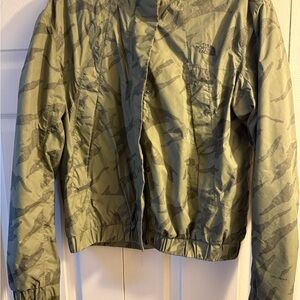 The North Face Olive and Black Women's Jacket with Subtle Camo Accents